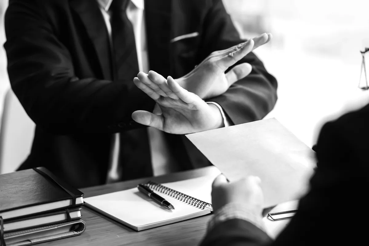 Avoid These Major Mistakes On Your Law Firm Website, shows lawyer telling their client no