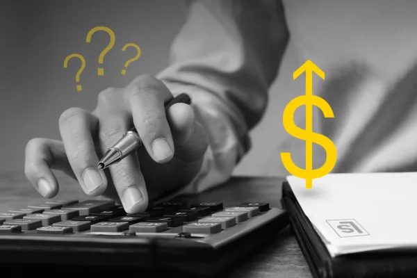 Cost Per Lead Calculation for Law Firms, shows attorney using a calculator to figure out their Cost Per Lead