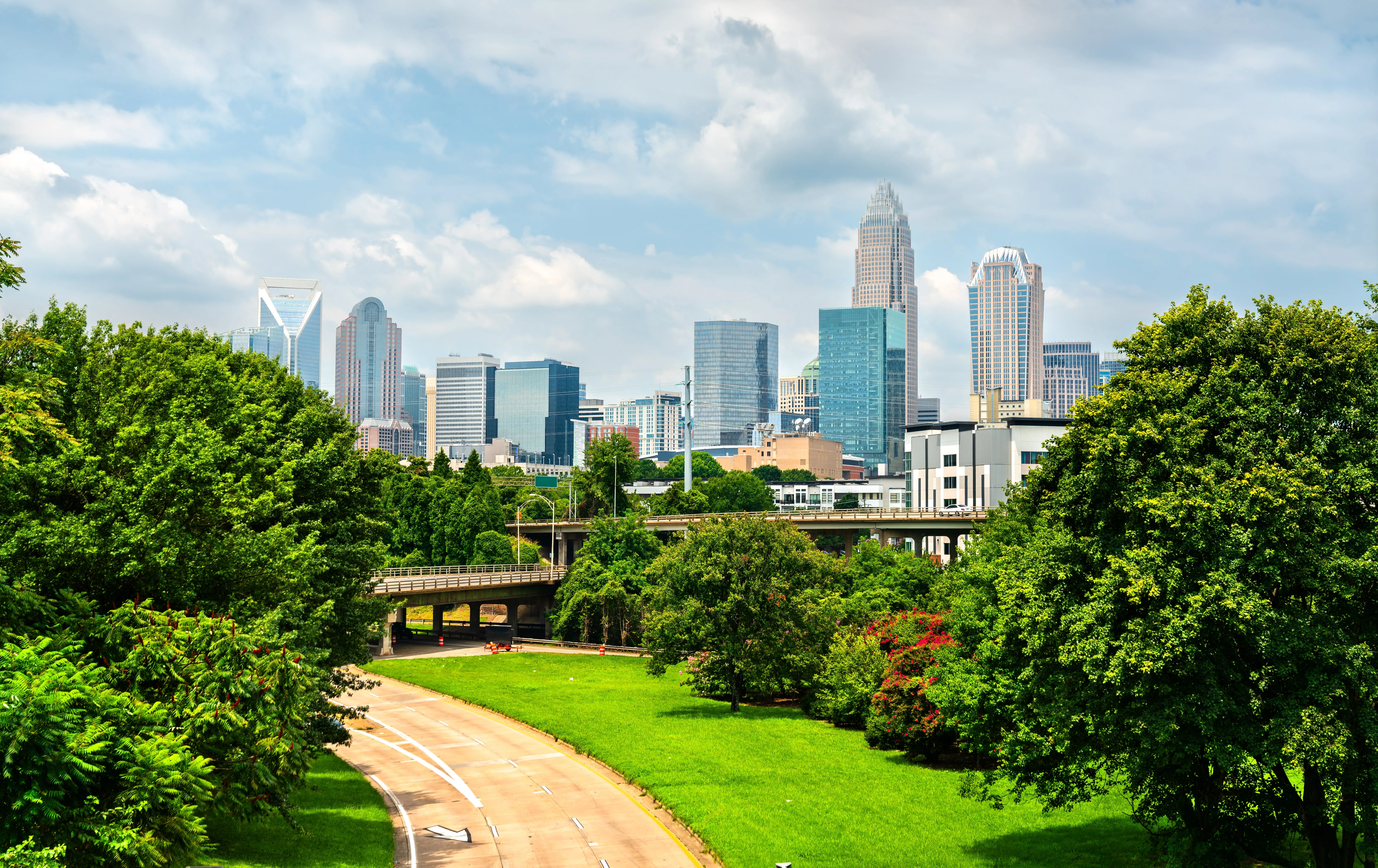 The beautiful tree-framed skyline of Charlotte, North Carolina