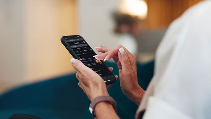 A client clicks through a law firm digital ad on a smartphone