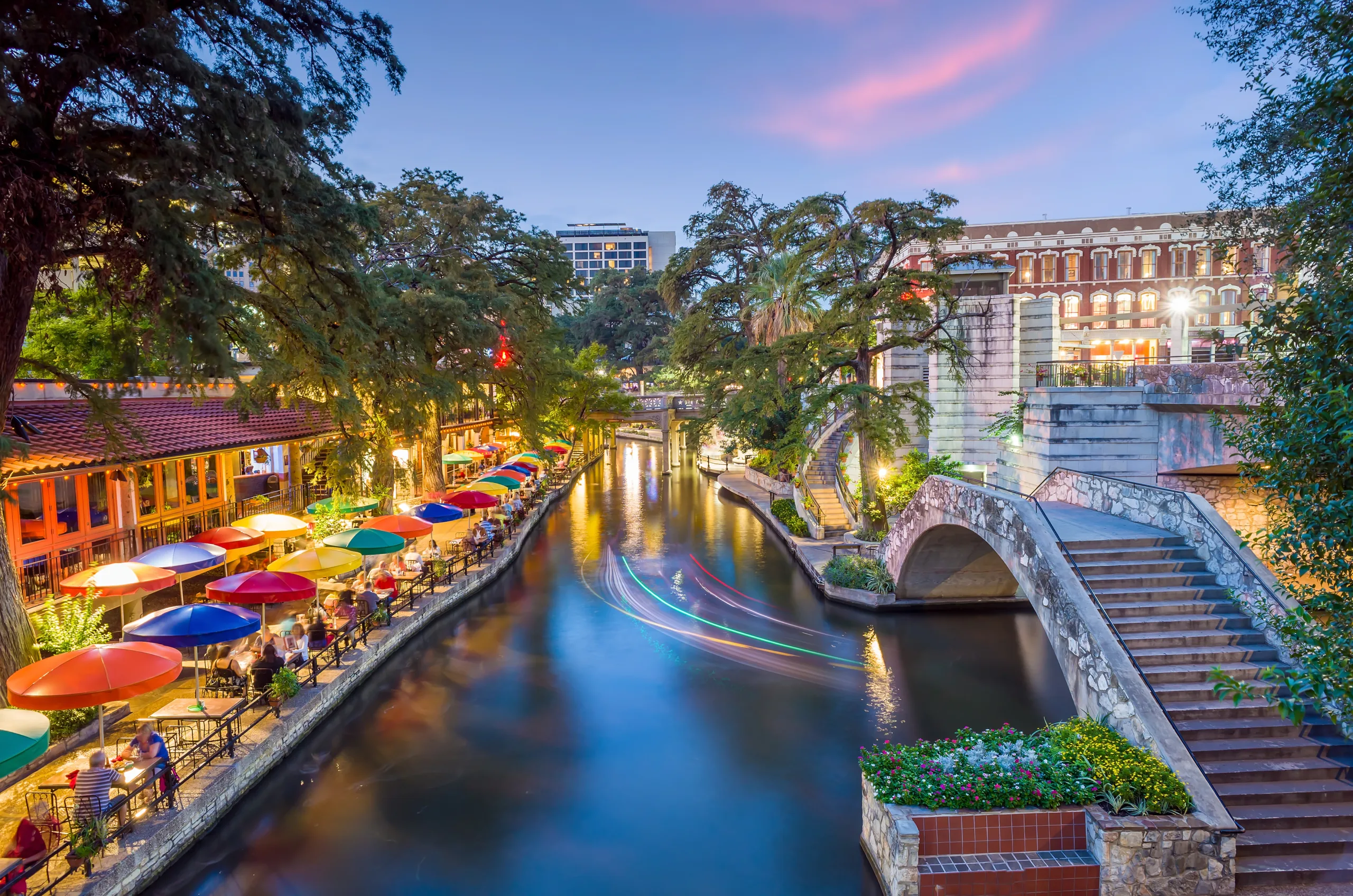 Picturesque photo of the San Antonio Riverwalk at dusk. San Antonio, TX.