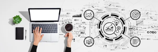 An attorney uses AI tools to plan a content strategy at a laptop with a graphic representation of the strategy pouring out across the screen.