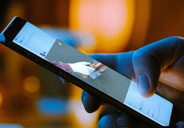 A potential client scrolling a digital advertisement for home services on a smartphone
