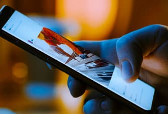 A client views a home services digital ad on a smartphone