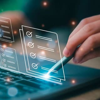 A laptop shows online business reviews to represent the importance of digital reputation management